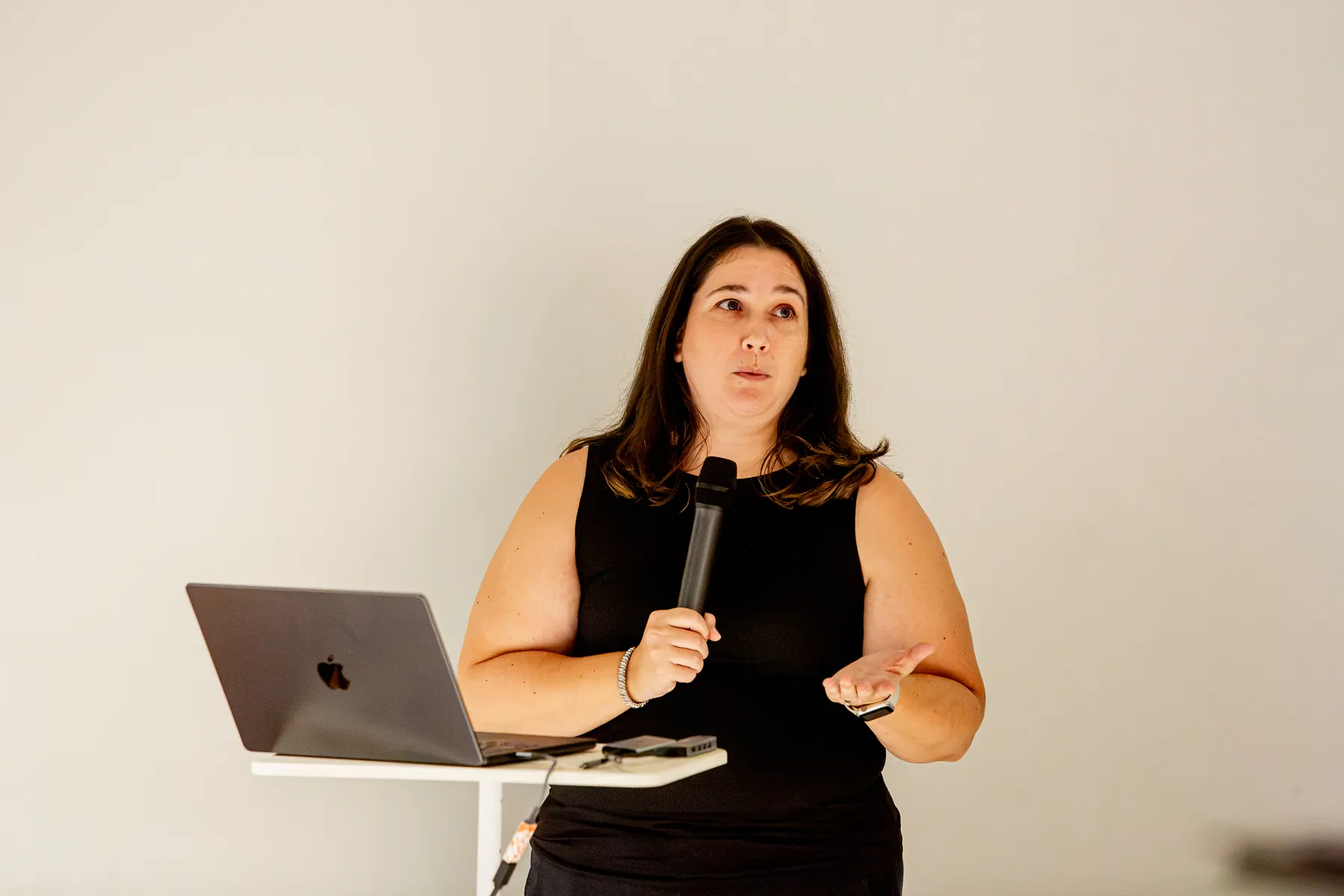 A community organization representative speaks at the Austin meetup